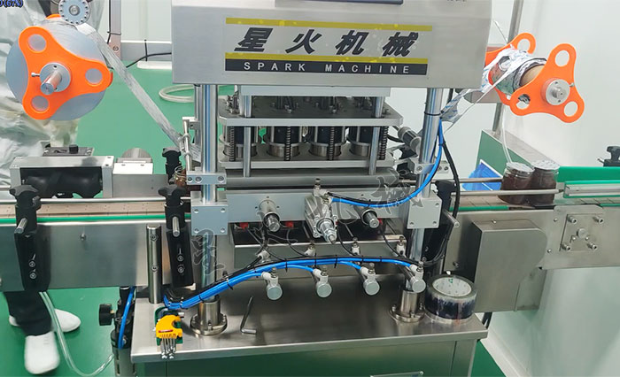 塑料瓶自動封膜機設備