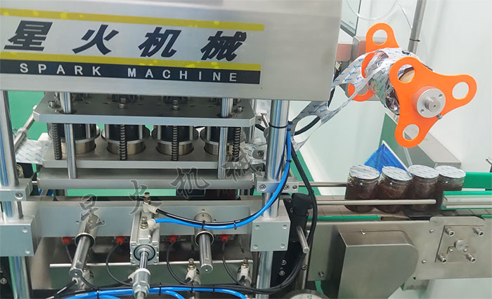 塑料瓶自動封膜機設備展示
